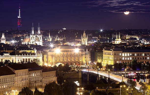 istock Night Prague cityscape at full moon. 481513832