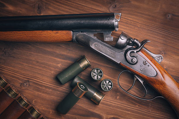 istock Shotgun on wooden background 481518079