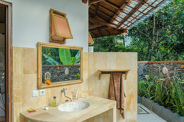 istock open air sink and mirror with palms in jungle -Bali 481519622
