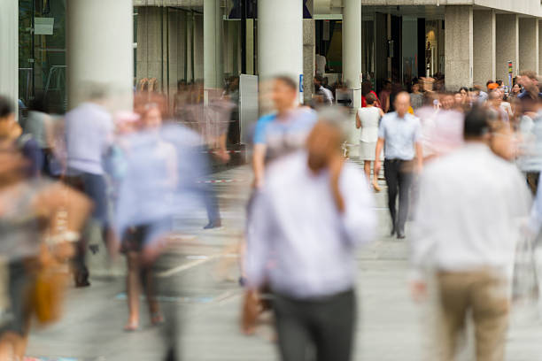 istock Office workers commuting at Raffles Place, Singapore 481526118
