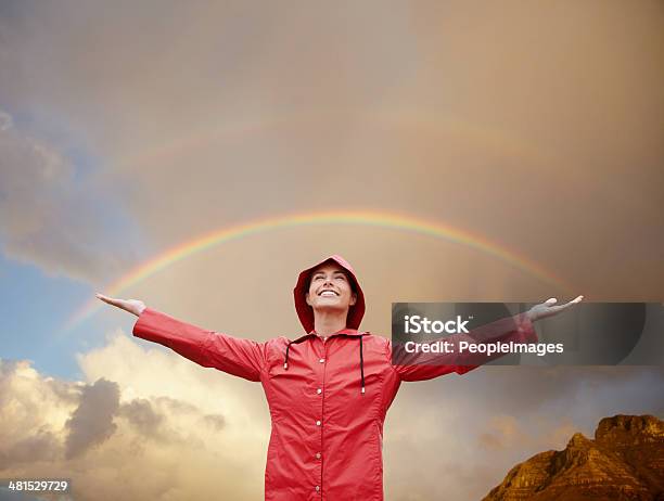 Shes Found Her Rainbow Moment Stock Photo - Download Image Now - Rainbow, People, Storm