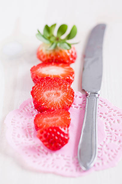 istock Sliced strawberry and knife 481535377