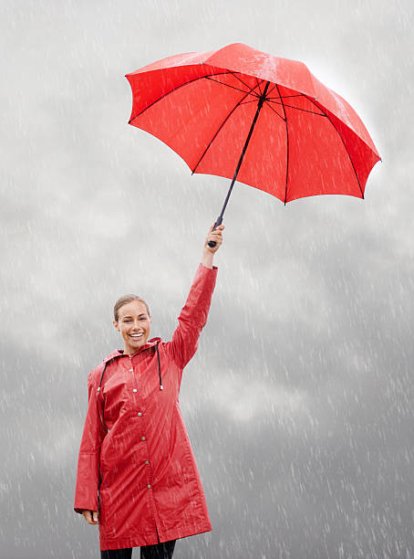 istock Her attitude shines through the rain 481535975