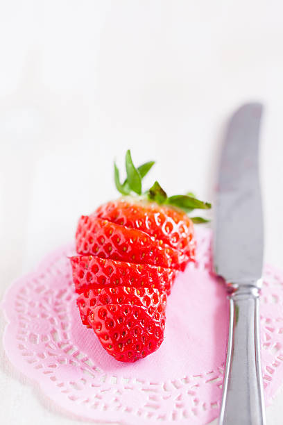 istock Sliced strawberry and knife 481536891