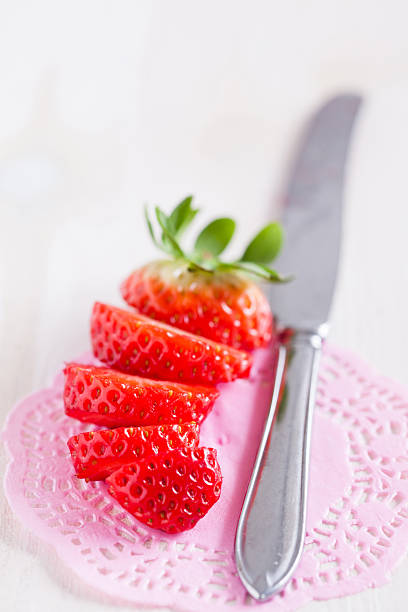 istock Sliced strawberry and knife 481536893