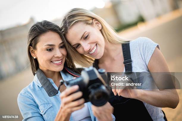 Women Taking Pictures Outdoors Stock Photo - Download Image Now - 20-29 Years, 2015, Adult