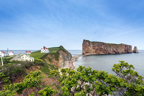Perce Rock in Perce, Quebec Canada Perce rock is a huge sheer rock formation in the Gulf of Saint Lawrence on the tip of the Gaspe Peninsula in Quebec, Canada. gulf of st lawrence photos stock pictures, royalty-free photos & images
