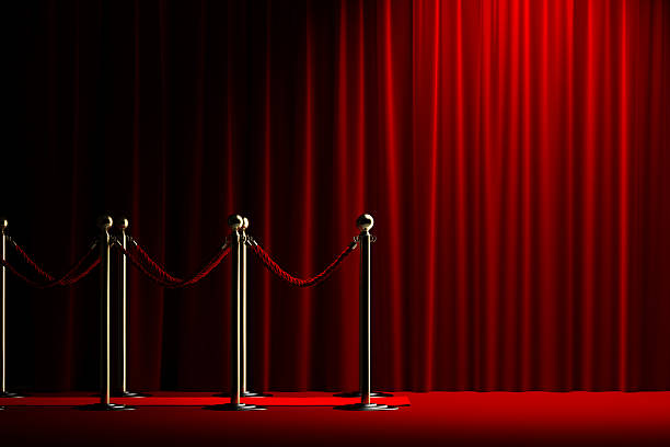 Rope barrier with red carpet and curtain Velvet red rope barrier with a shining curtain on the right upper class photos stock pictures, royalty-free photos & images