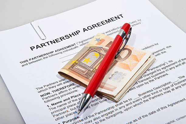 istock Partnership agreement forms with Euro money and pen 481542723