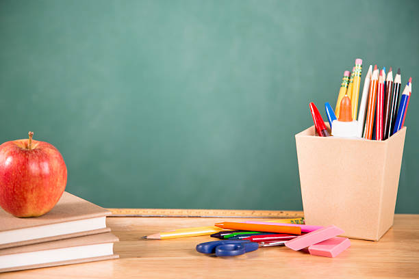 istock Back to school. School supplies, apple on desk. Education. 481543684