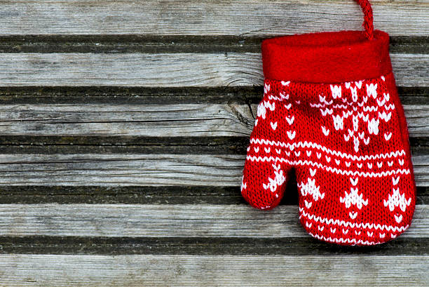 istock Christmas Red Knitted Mitten with Snowflake Motives 481545758