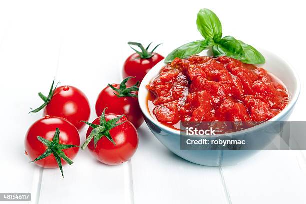 Photo libre de droit de Tomates Coupées En Cube banque d'images et plus d'images libres de droit de Tomate - Tomate, Sauce tomate, Broyé