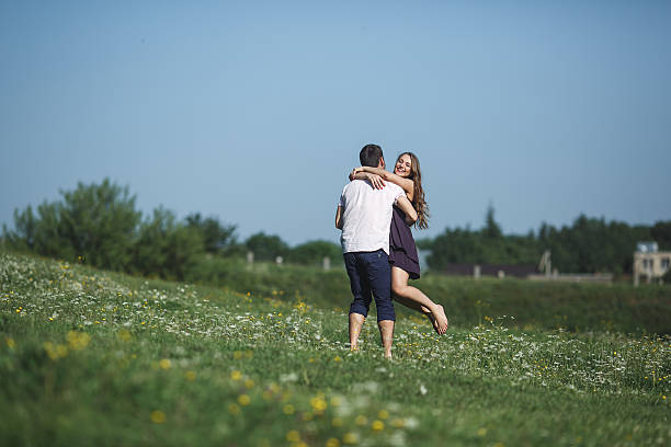 istock Couple running in field and have fun 481547484