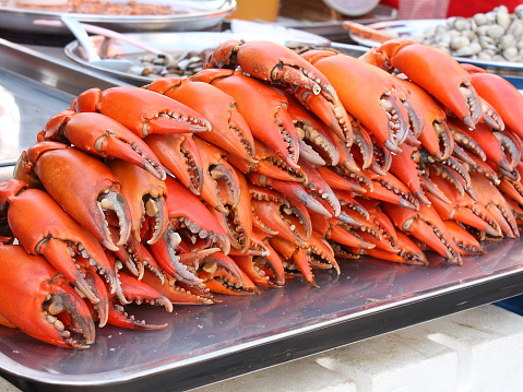 Crab claws (pincers) for sale at a fish market stall in Bangkok (Thailand)