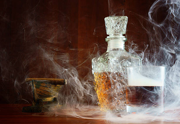 istock Eau-de-vie in the smoke cigars 481552675