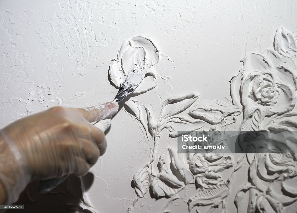 Artists hand and white flowers pattern Activity Stock Photo