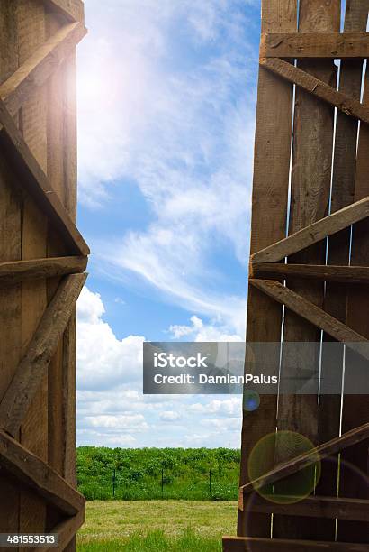 An Open Gate Of A Barn Stock Photo - Download Image Now - Opening, Door, Fence