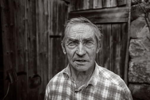Portrait of old farmer in Austria in black and white