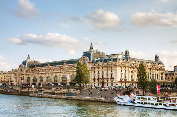 D'Orsay museum in Paris, France Paris, France - October 9, 2014: D'Orsay museum with people in Paris, France. The Musee d'Orsay is the French art  museum in Paris, on the left bank of the Seine. musee dorsay stock pictures, royalty-free photos & images
