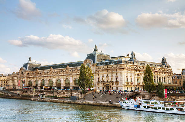 D'Orsay museum in Paris, France Paris, France - October 9, 2014: D'Orsay museum with people in Paris, France. The Musee d'Orsay is the French art museum in Paris, on the left bank of the Seine. musee dorsay stock pictures, royalty-free photos & images