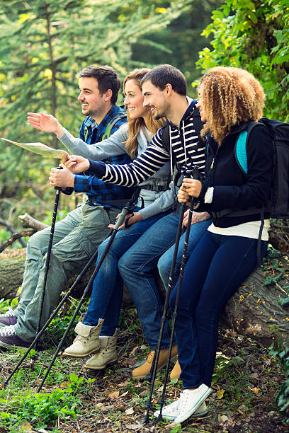 istock Friends looking at map on hiking. 481560877