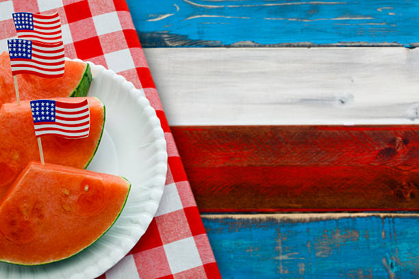 istock Patriotic Picnic with US Flags in Watermelon Slices 481564304