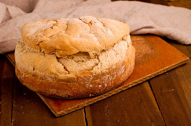 istock Homemade, fresh bread on wooden background 481564434