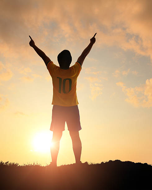 istock Man and soccer silhouette 481566257