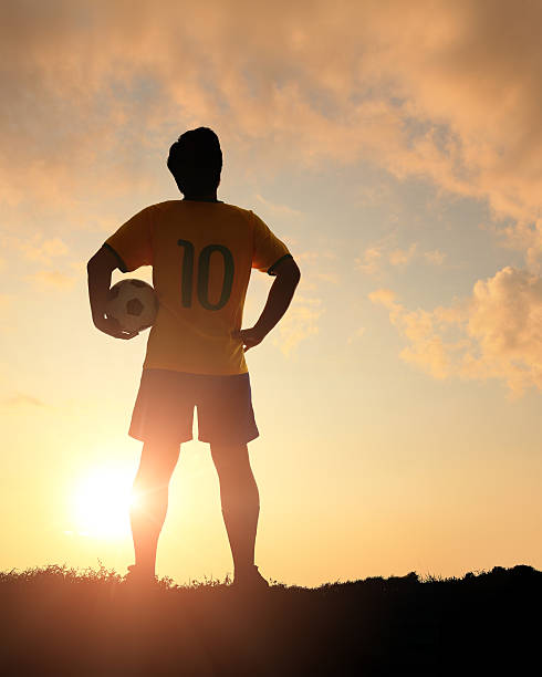 istock Man and soccer silhouette 481566287