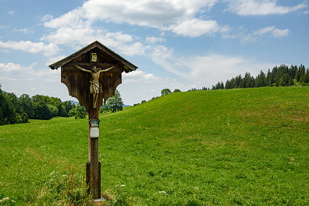 istock Wooden crucifix in a meadow 481567584