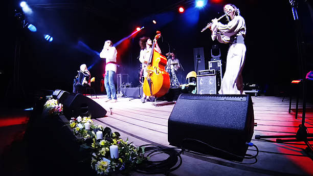 istock music band performing a concert 481567970