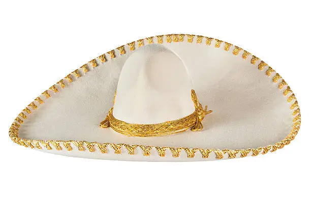 This is a special elegant hat used in dances and fiestas in Mexico. It is made using gold thread as a type of embroidery