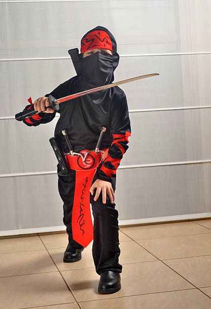 istock Boy dressed up for Halloween / Purim as a Ninja 481568511