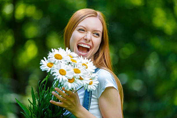 istock Beautiful smiling red-haired young woman 481570016