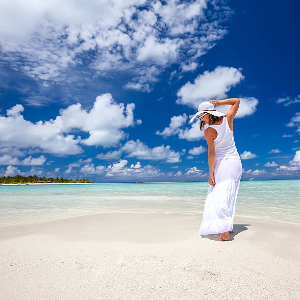 istock Caucasian woman rests at beautiful seashore 481572389