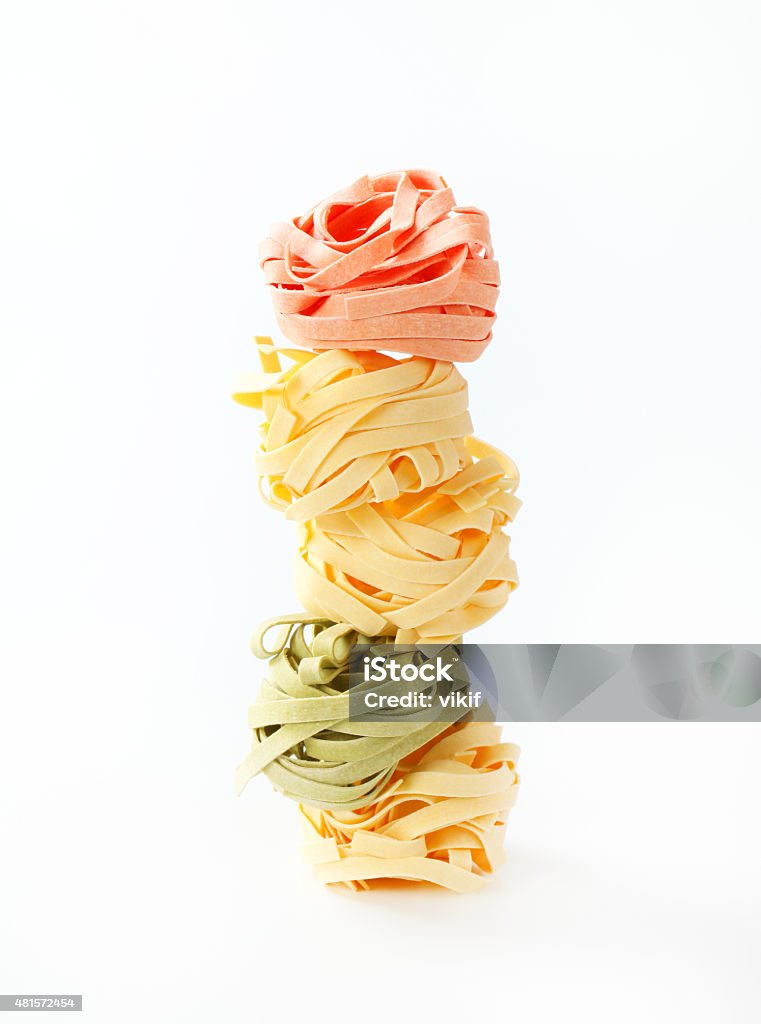 Dried ribbon pasta Bundles of dried ribbon pasta 2015 Stock Photo