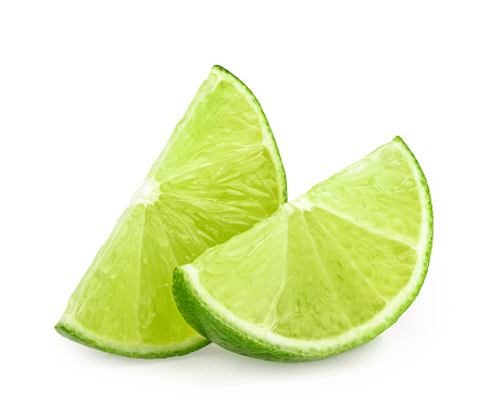 Green limes isolated on white background