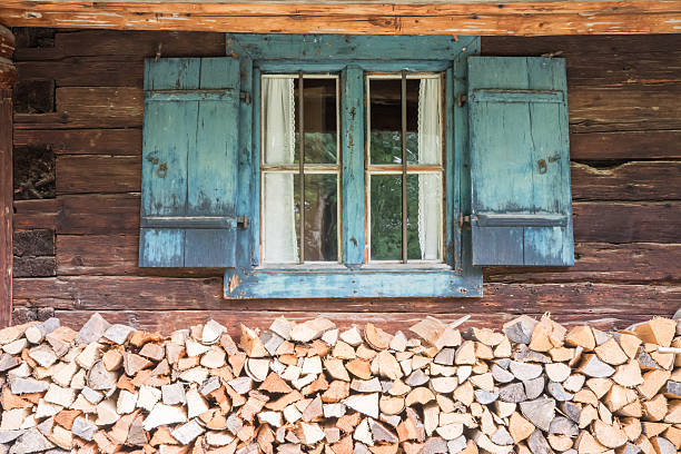 Old weathered widow Old weathered widow of a traditional farm house fuelwood stock pictures, royalty-free photos & images