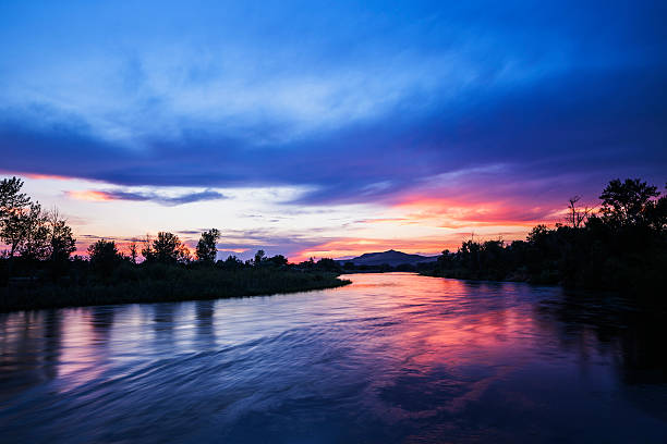 I live very close to Boise River, Boise, Idaho and that helps me to capture beautiful sunsets along Boise River. In this image, while I was waiting for colors to show up in the sky just after sunset, to my delight, pink color exploded in the part of the sky and I was able to capture this pleasing image. I have experienced so many sunsets along Boise River and believe me each sunset is special in its own way.