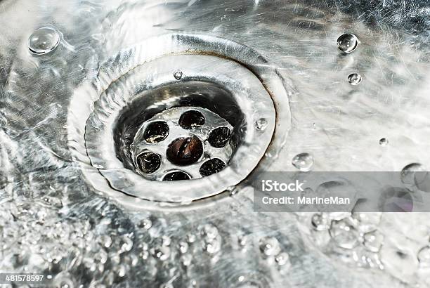 Stainless Steel Sink Plug Hole Close Up With Water Stock Photo - Download Image Now - Drain, Pipe - Tube, Water