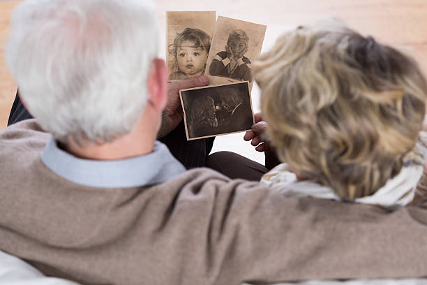 istock Seniors looking at old pictures 481582374