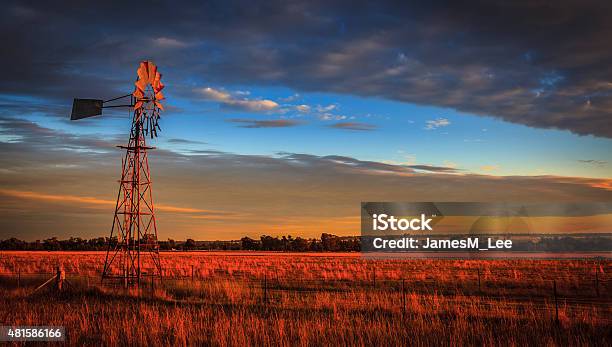 Windmill At Sunset Outback Australia Stock Photo - Download Image Now - Australia, Outback, Farm