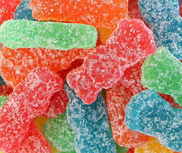 Sour Candy A background of sour candy bitter stock pictures, royalty-free photos & images