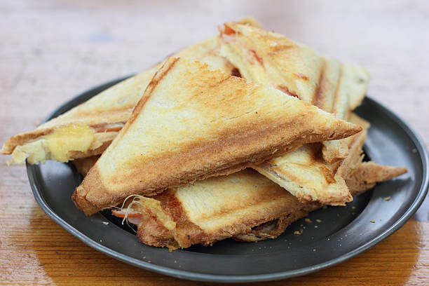 Triangle toasted sandwiches. stock photo