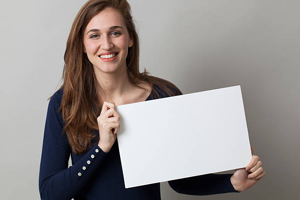 istock joyful 20s woman enjoying making an advertisement 481609664