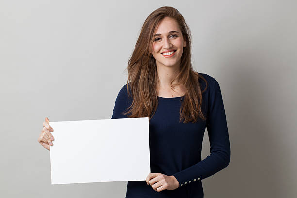 istock happy 20s woman making an announcement 481609666
