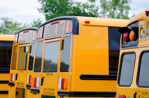 istock Close Up of Parked Yellow American School Buses 481609704
