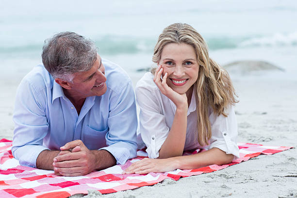 istock Happy couple lying on a blanket 481615046