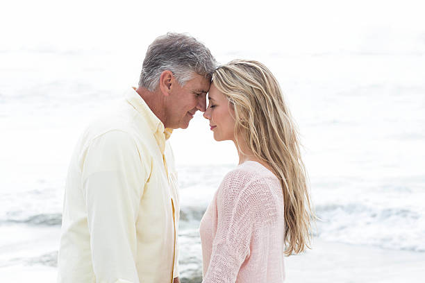 istock Happy couple holding hands and hugging each other 481615386