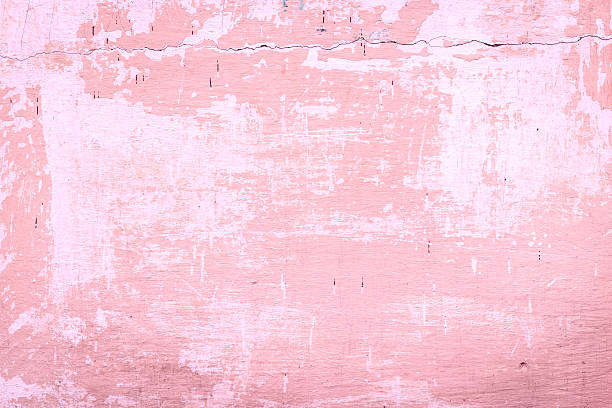 Texture. Wall Texture. Wall. A background with attritions and cracks pink painted brick wall stock pictures, royalty-free photos & images